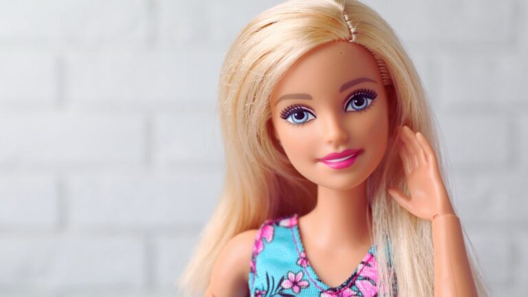 Autistic Barbie doll in a blue floral dress, highlighting inclusive toys and inclusion in play.