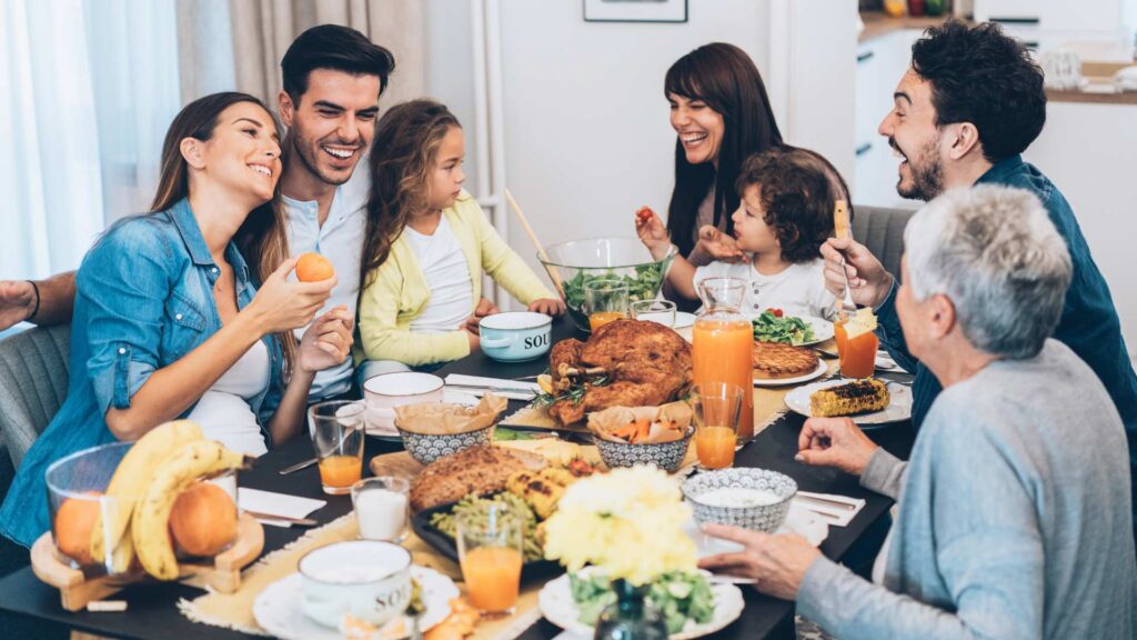Family Enjoying Thanksgiving Dinner