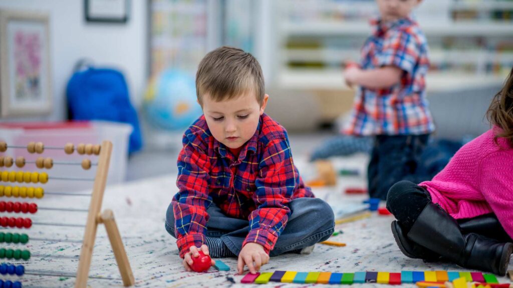 Kid with autism playing