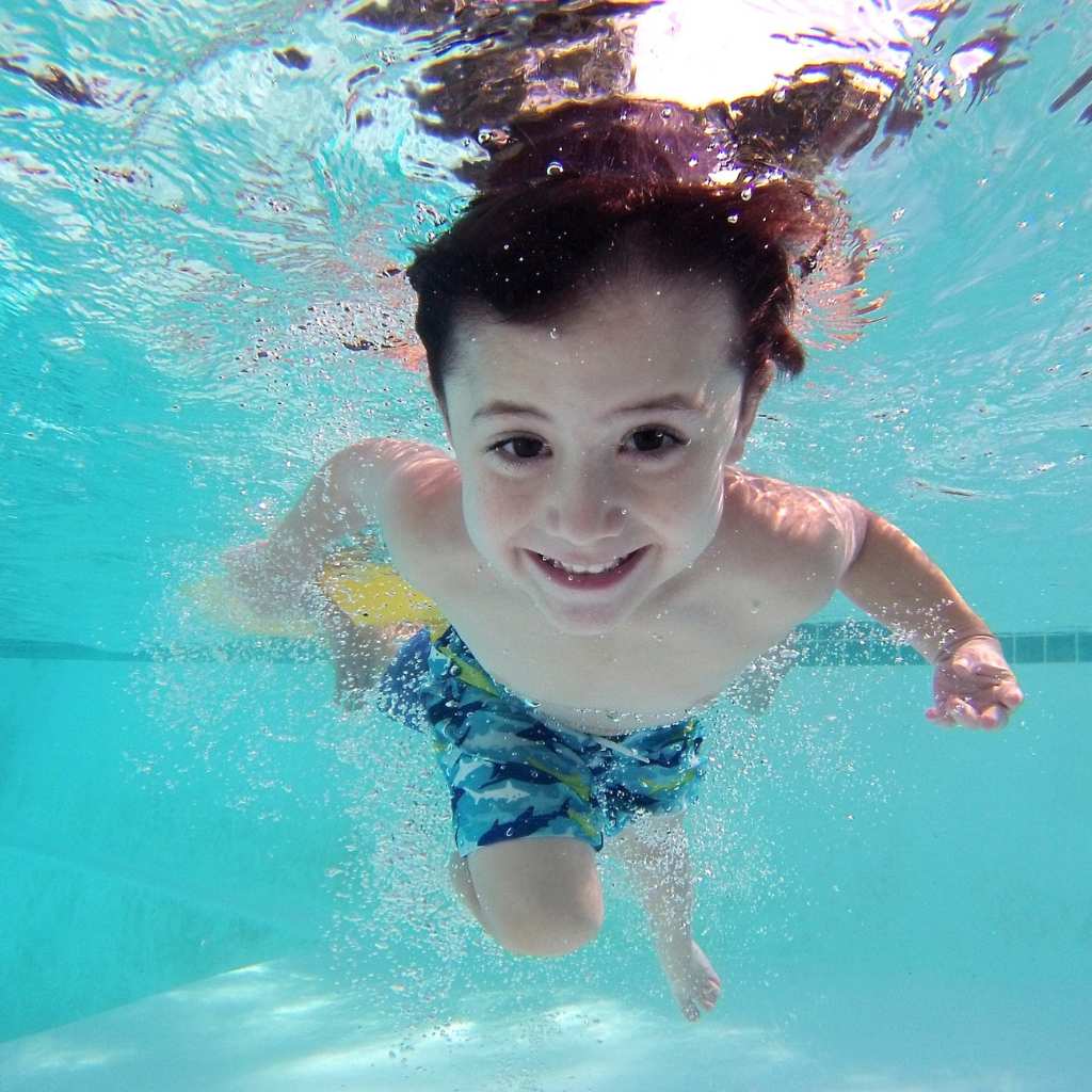 8 Autism-Friendly Summer Activities in Virginia Kid having fun in a pool
