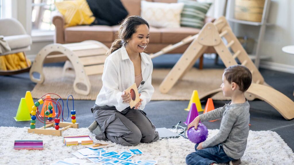 What Parents Wish They Knew About Having a Child with Autism Therapist using play-based activities to support a child with autism
